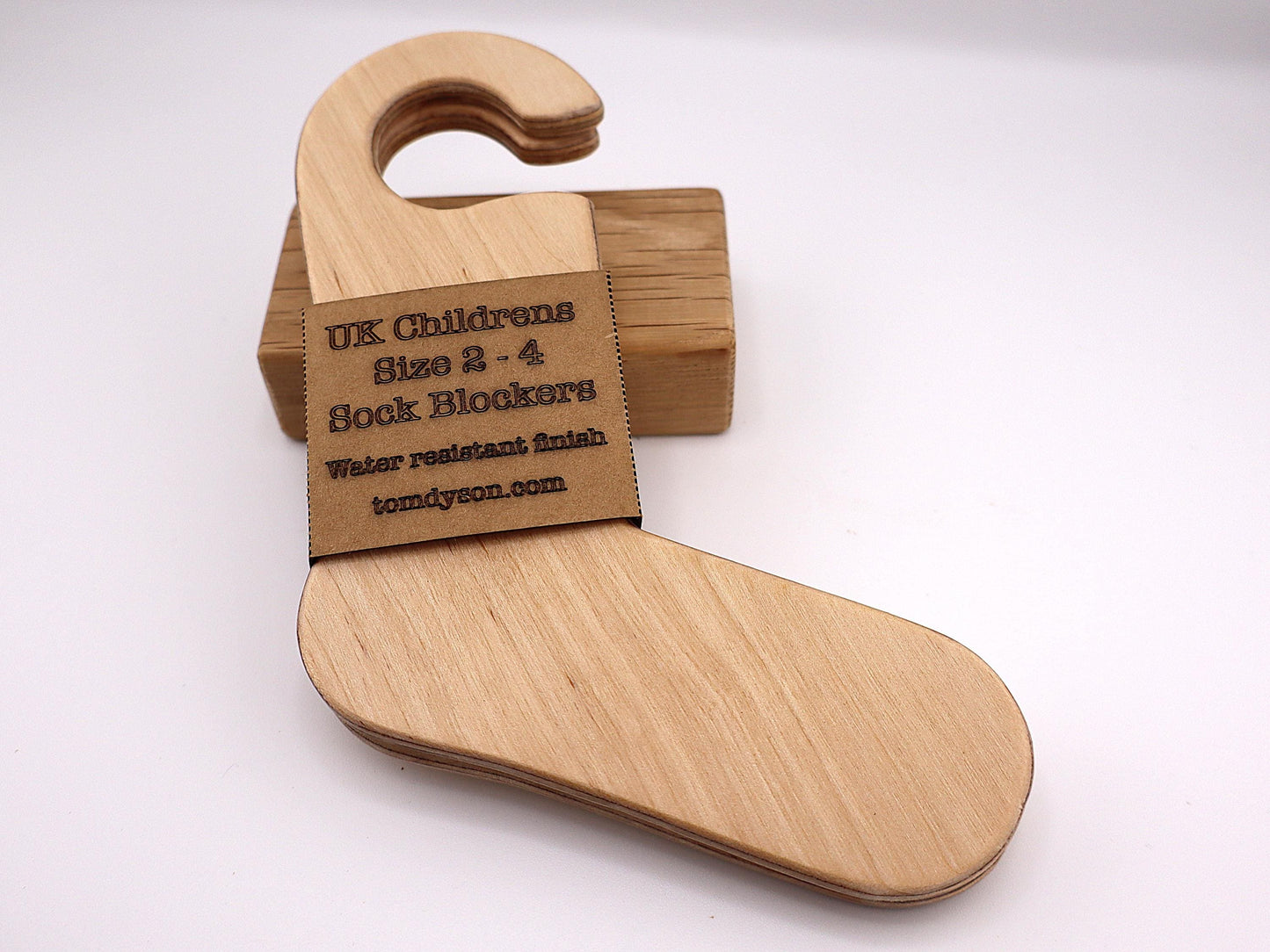 Handmade wooden sock blockers for UK children’s sizes 2–12.
