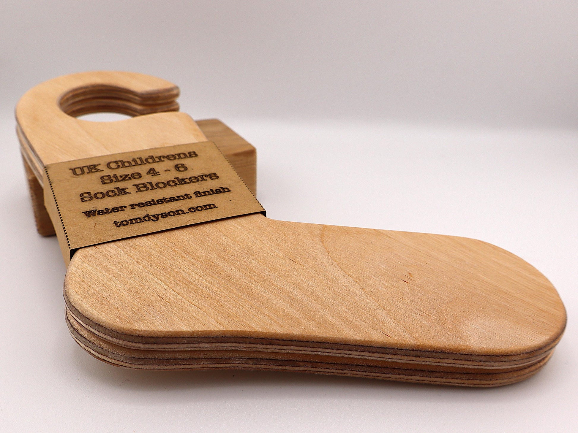 Handmade wooden sock blockers for UK children’s sizes 2–12.