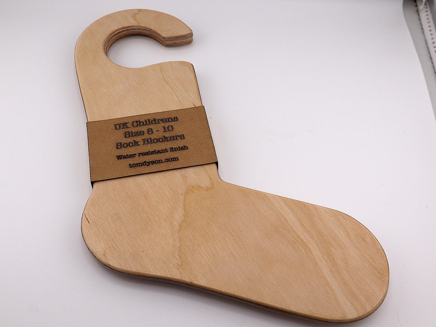 Handmade wooden sock blockers for UK children’s sizes 2–12.