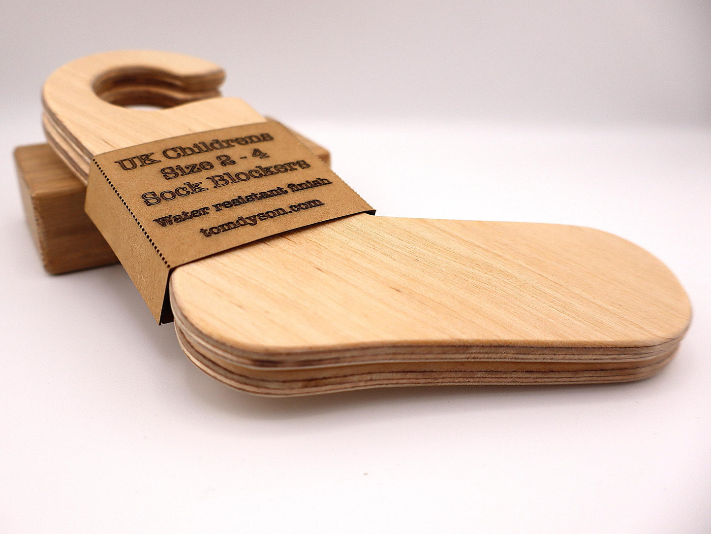 Handmade wooden sock blockers for UK children’s sizes 2–12.