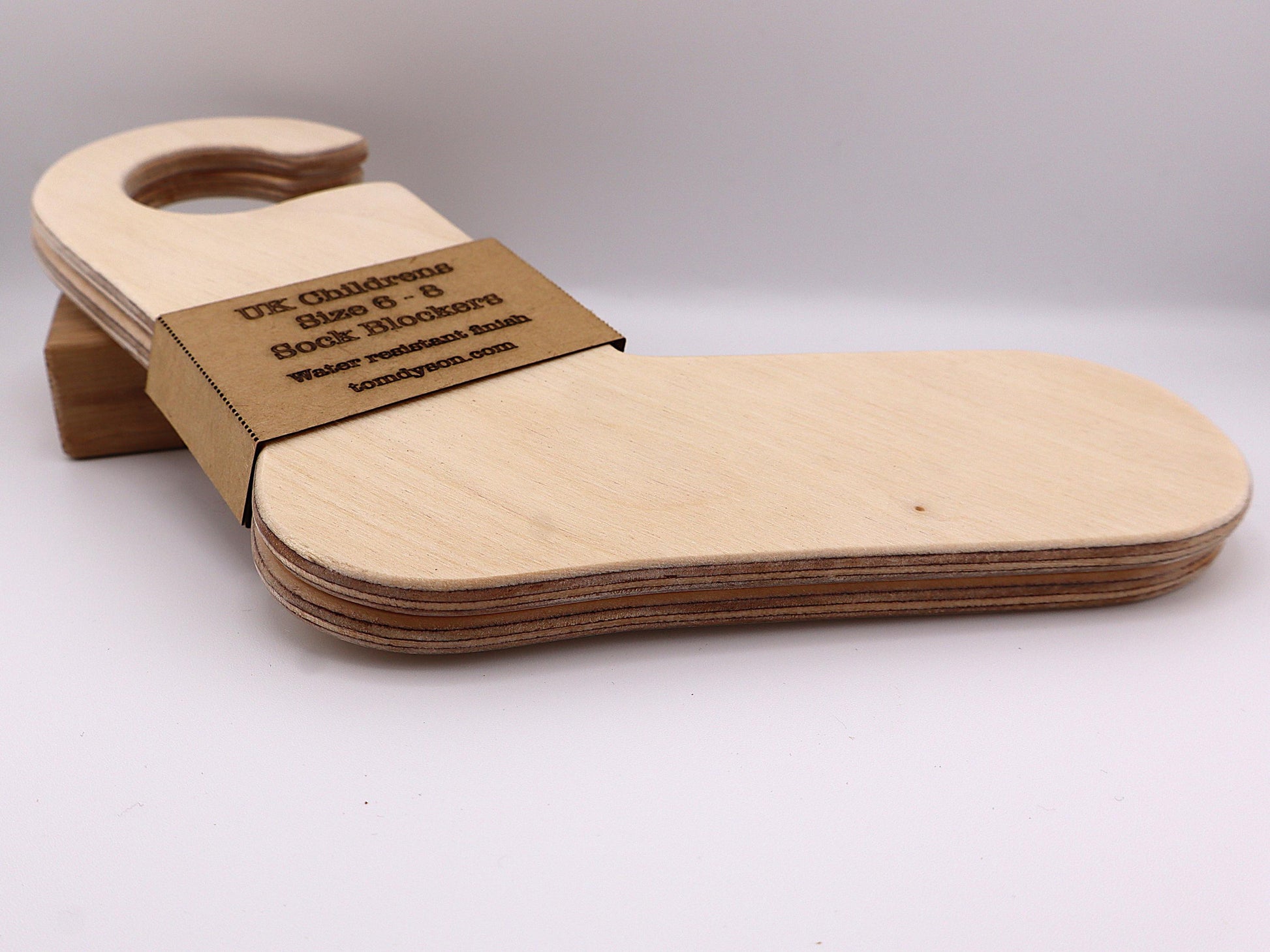 Handmade wooden sock blockers for UK children’s sizes 2–12.