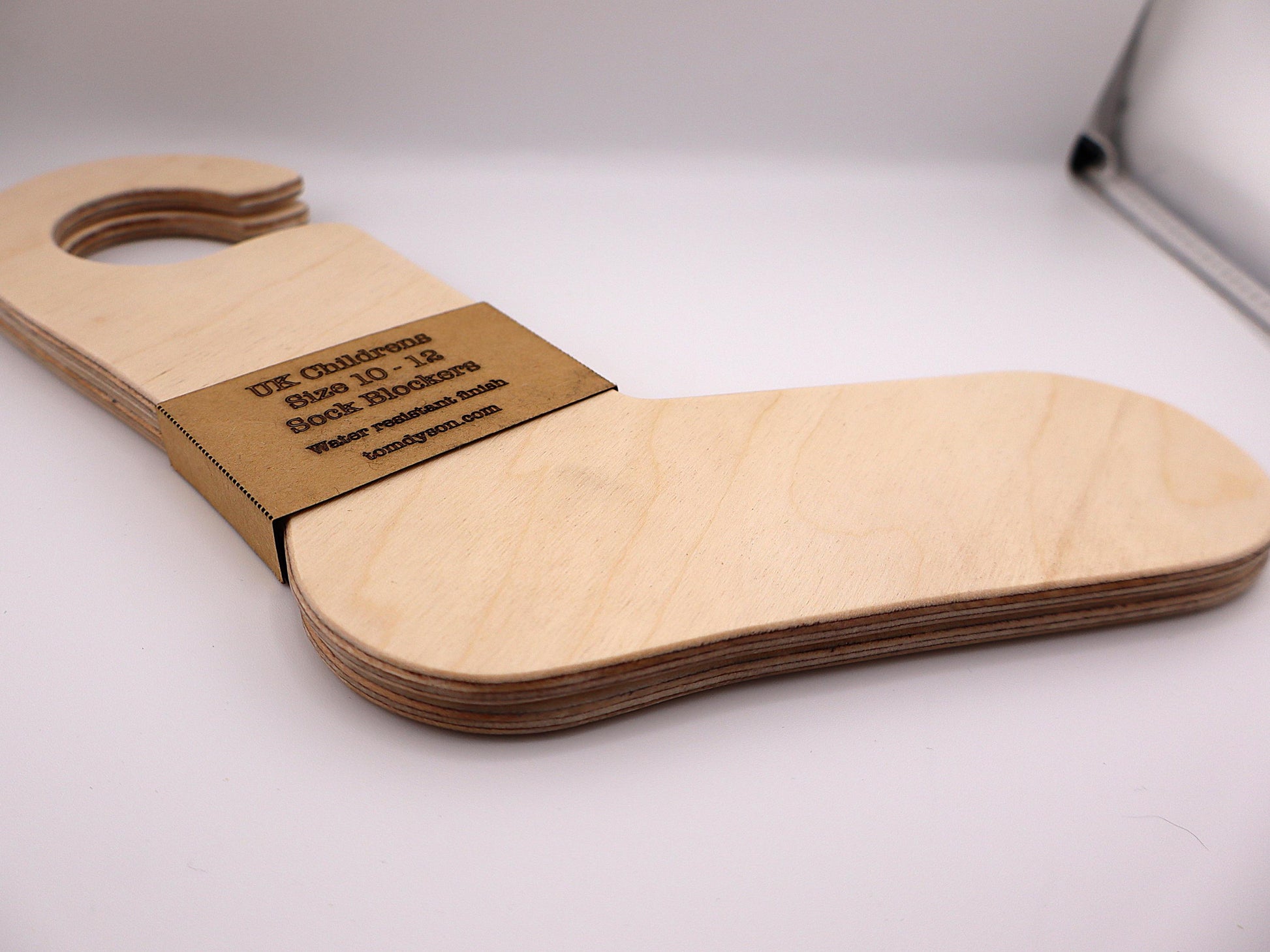 Handmade wooden sock blockers for UK children’s sizes 2–12.