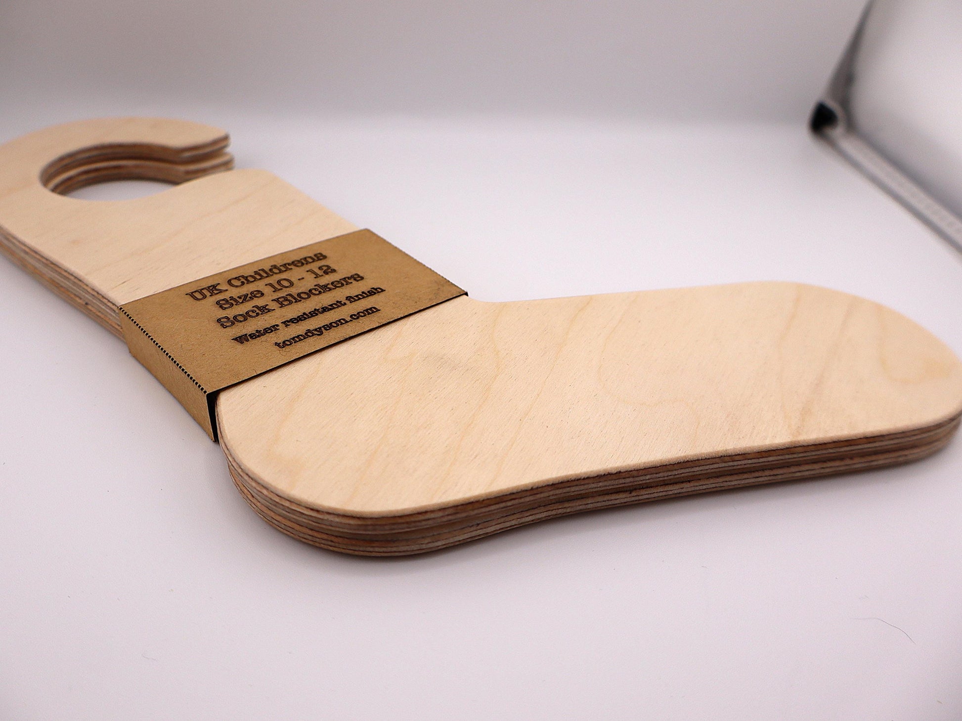 Handmade wooden sock blockers for UK children’s sizes 2–12.