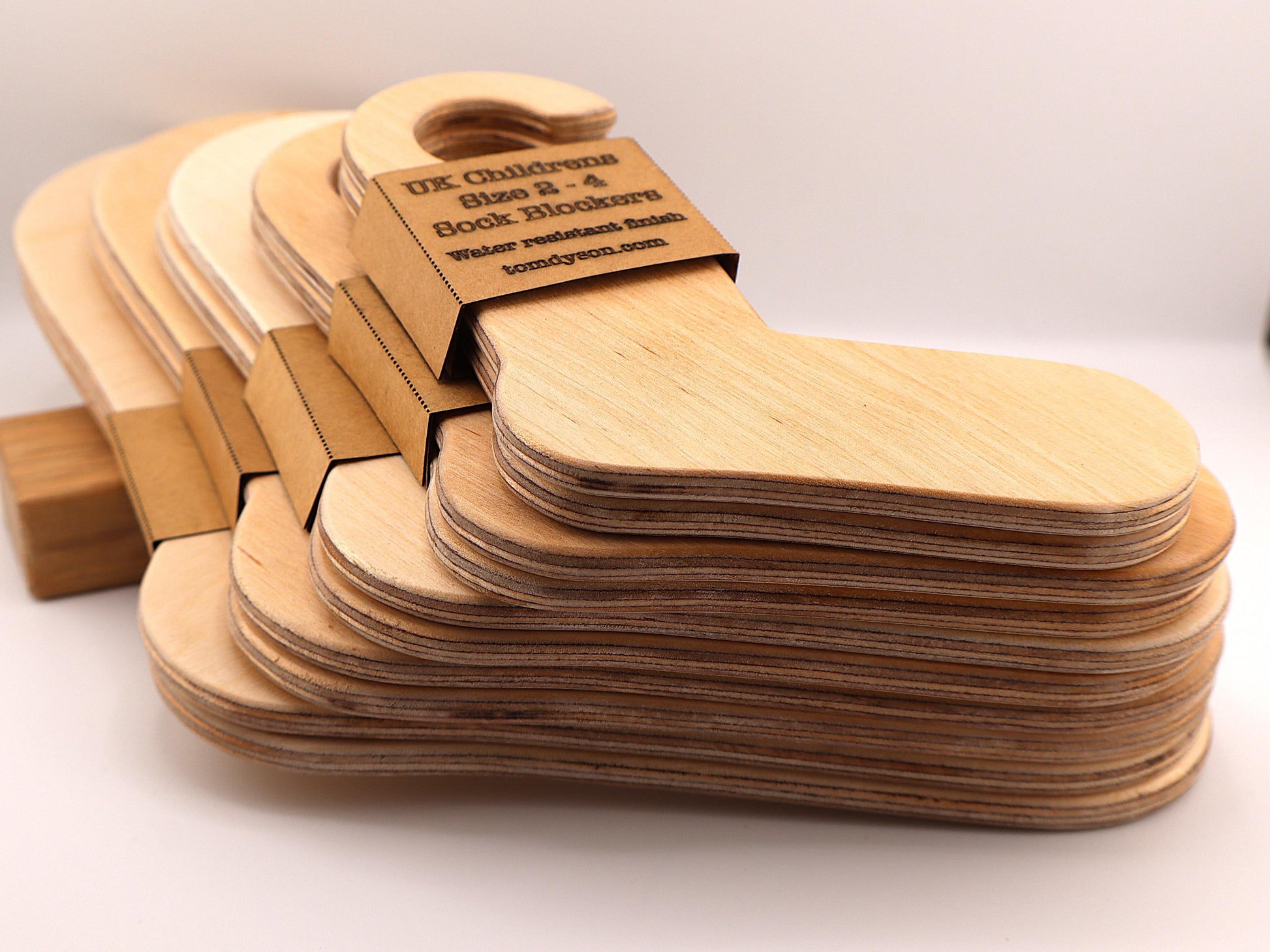 Handmade wooden sock blockers for UK children’s sizes 2–12.
