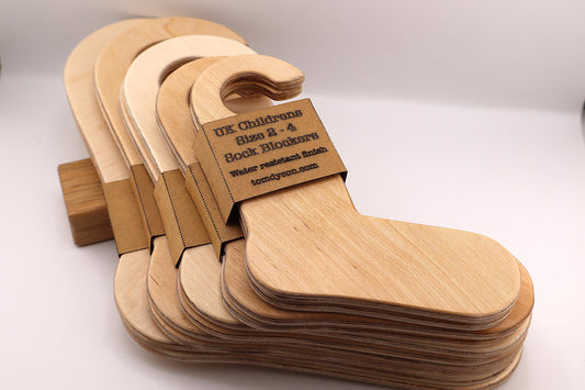 Handmade wooden sock blockers for UK children’s sizes 2–12.