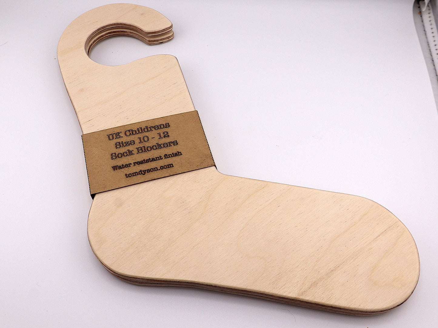 Handmade wooden sock blockers for UK children’s sizes 2–12.