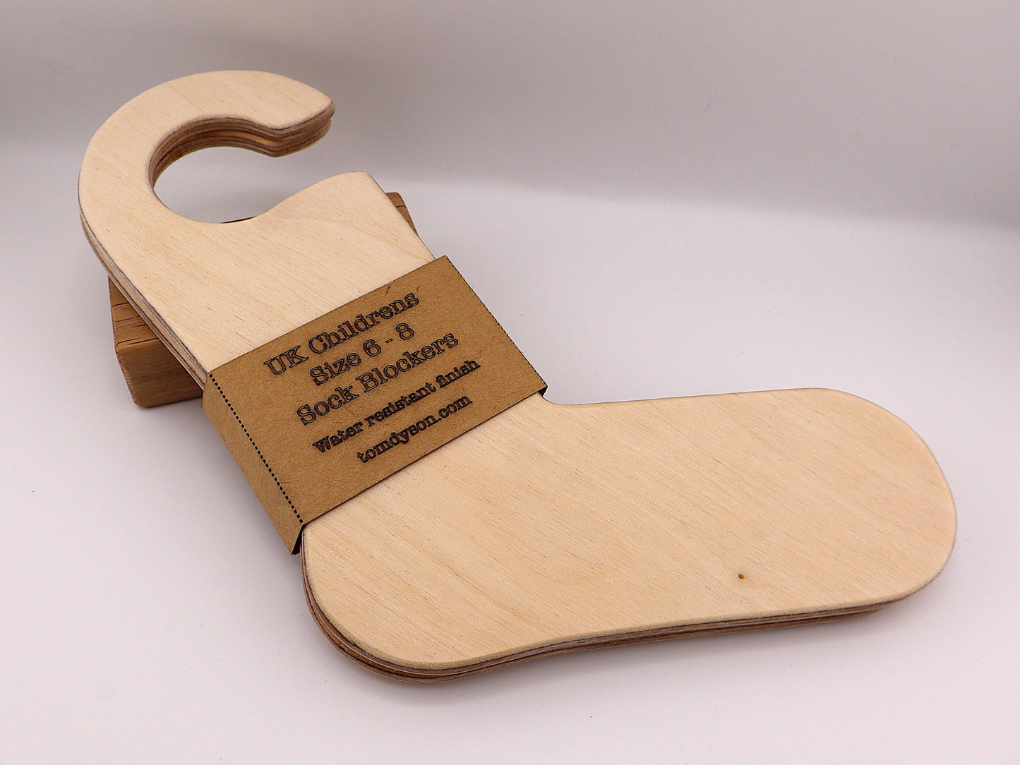Handmade wooden sock blockers for UK children’s sizes 2–12.